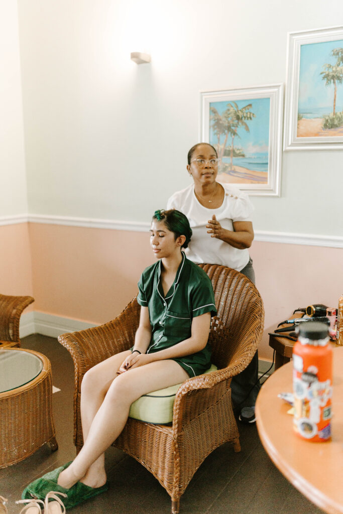 Bridesmaid gets hair done for wedding day at La Haut Resort in St. Lucia.