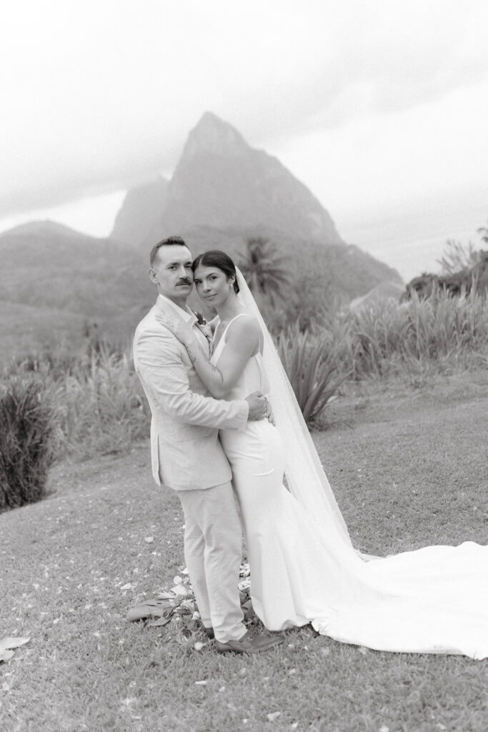 couples wedding day with the Pitons in the background at La Haut Resort in St. Lucia in black and white