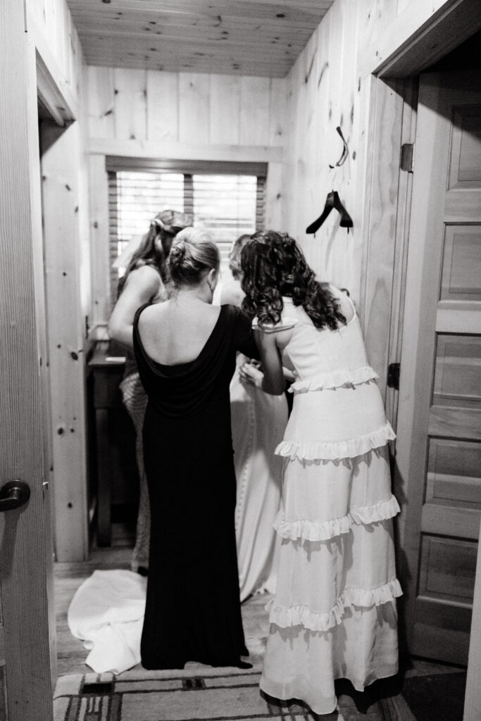 Bride gets ready for wedding day at Migis Lodge on Sebago lake