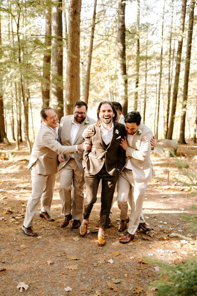 Groom party images before wedding day on Sebago lake at Migis Lodge