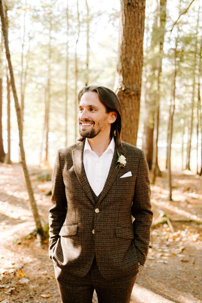 Groom images before wedding day on Sebago lake at Migis Lodge