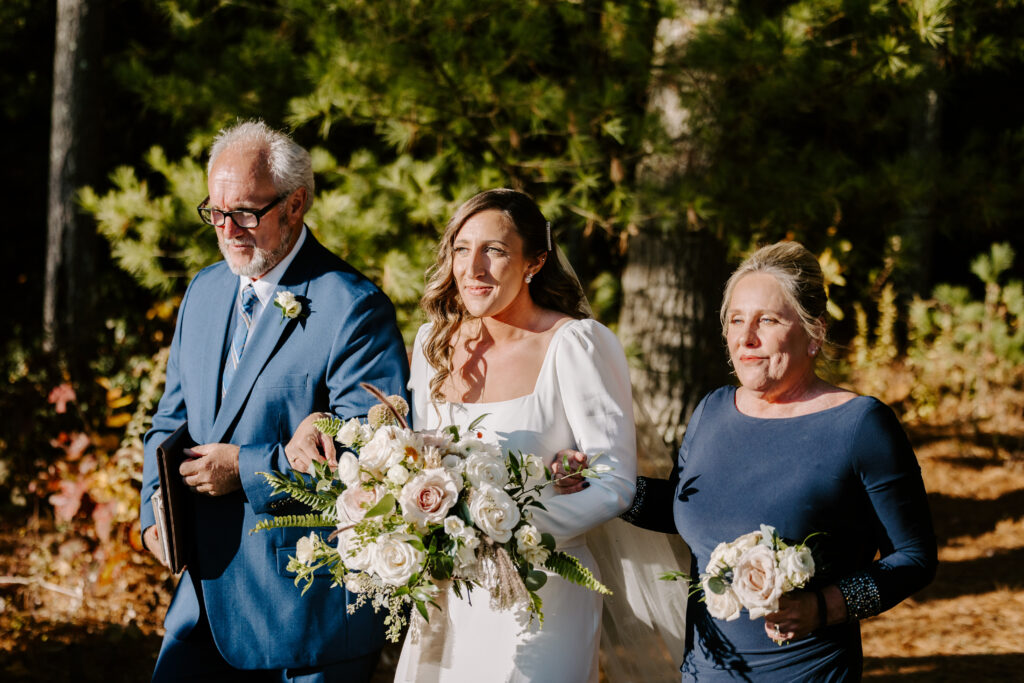 Wedding ceremony at Migis lodge lawn on Sebago lake, Maine