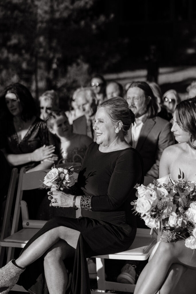 Wedding ceremony at Migis lodge lawn on Sebago lake, Maine
