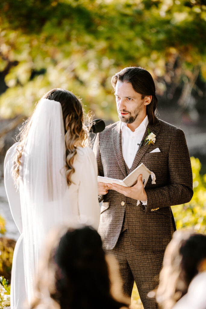 Wedding ceremony at Migis lodge lawn on Sebago lake, Maine