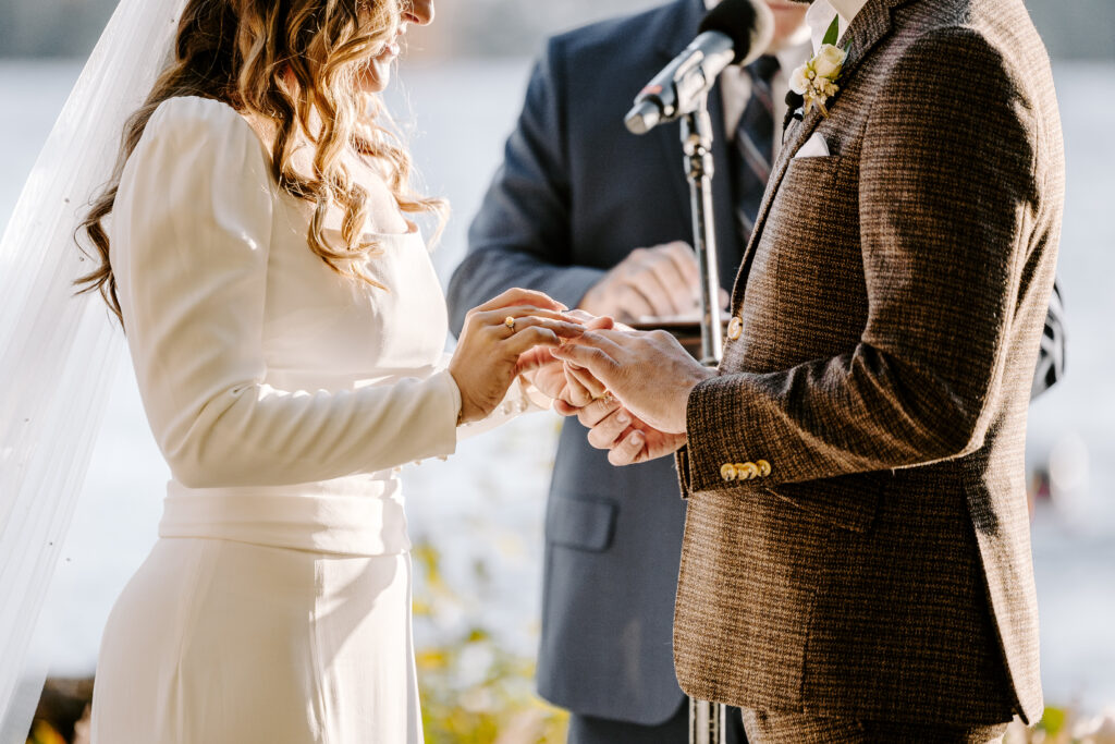 Wedding ceremony at Migis lodge lawn on Sebago lake, Maine