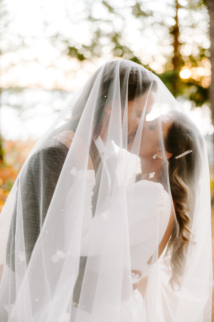 Bride and groom at wedding on Sebago lake at Migis Lodge