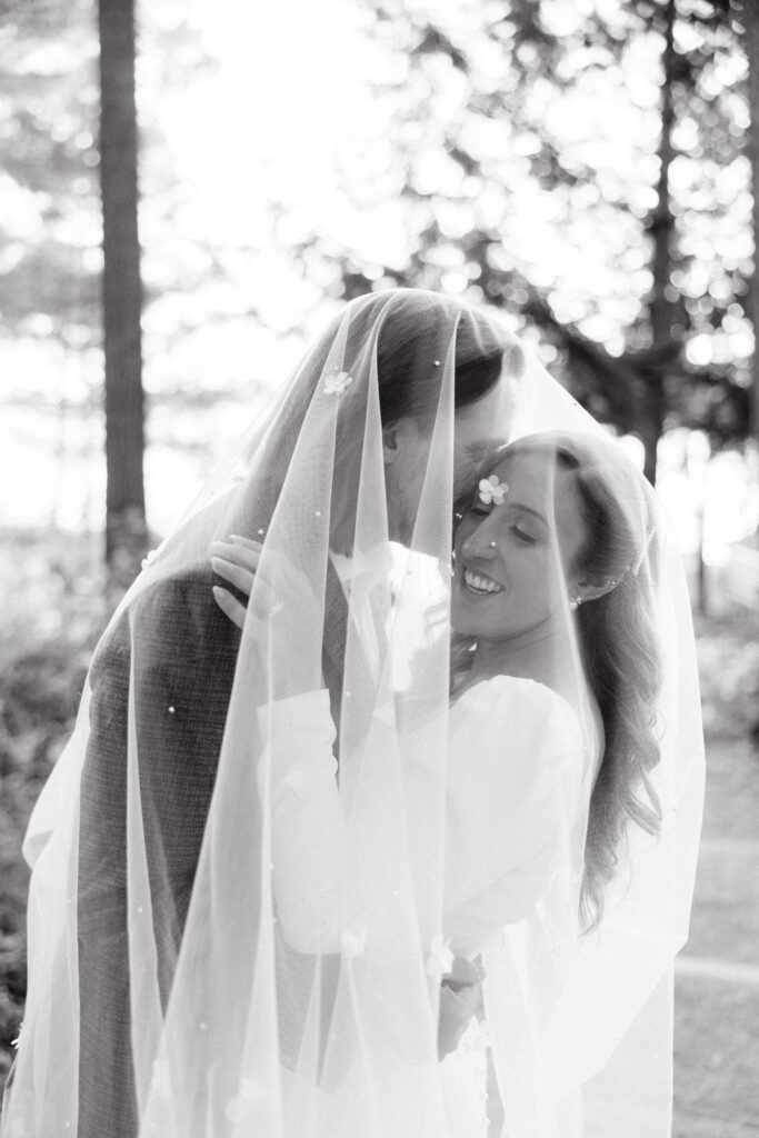 Bride and groom at wedding on Sebago lake at Migis Lodge