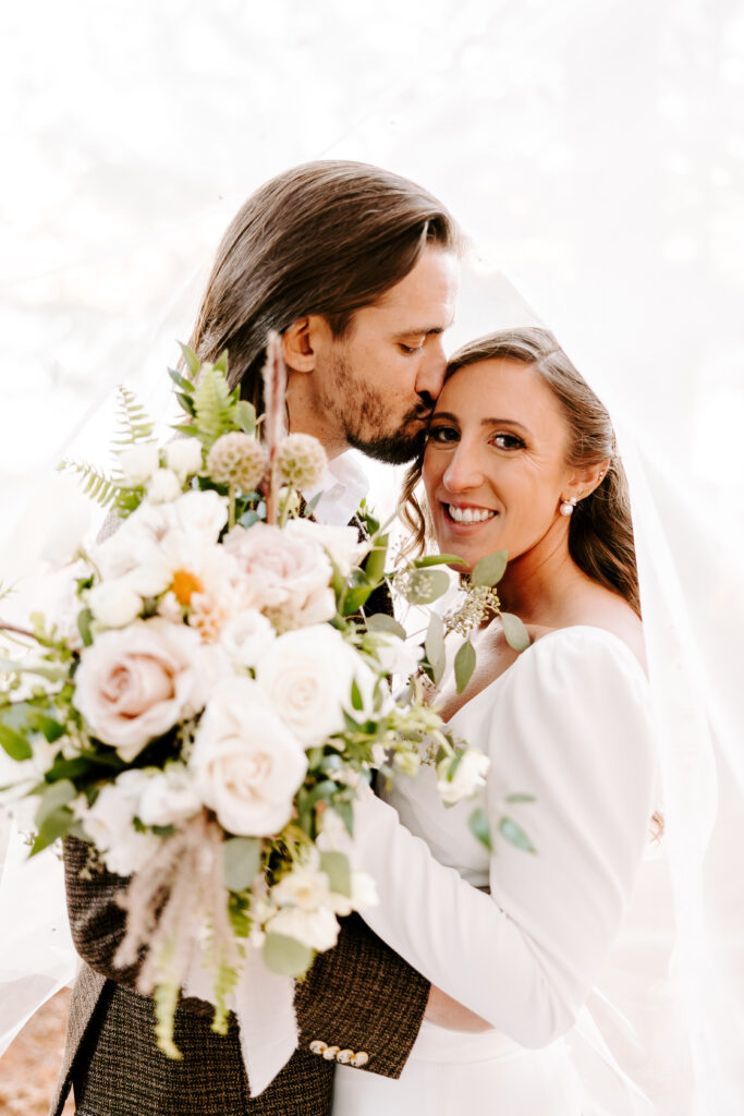 Bride and groom at wedding on Sebago lake at Migis Lodge