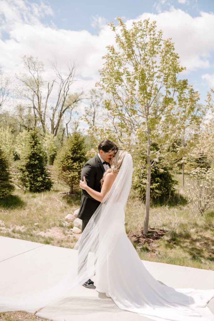 Bride and groom share first look at The Barn at Timber Pointe venue in Chicago, IL.