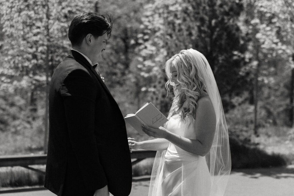 Bride and groom exchange vows at The Barn at Timber Pointe venue in Chicago, IL.