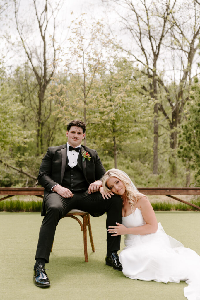 Bride and groom share editorial look for their wedding portraits at The Barn at Timber Pointe.