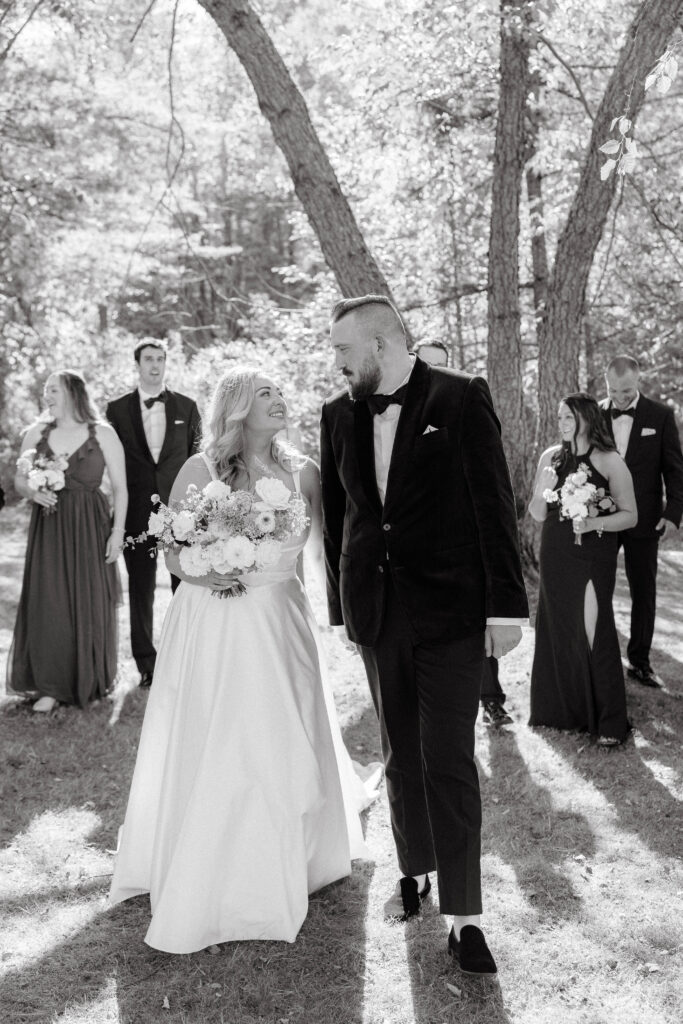 • Wedding party cheering with the bride and groom on Great Diamond Island