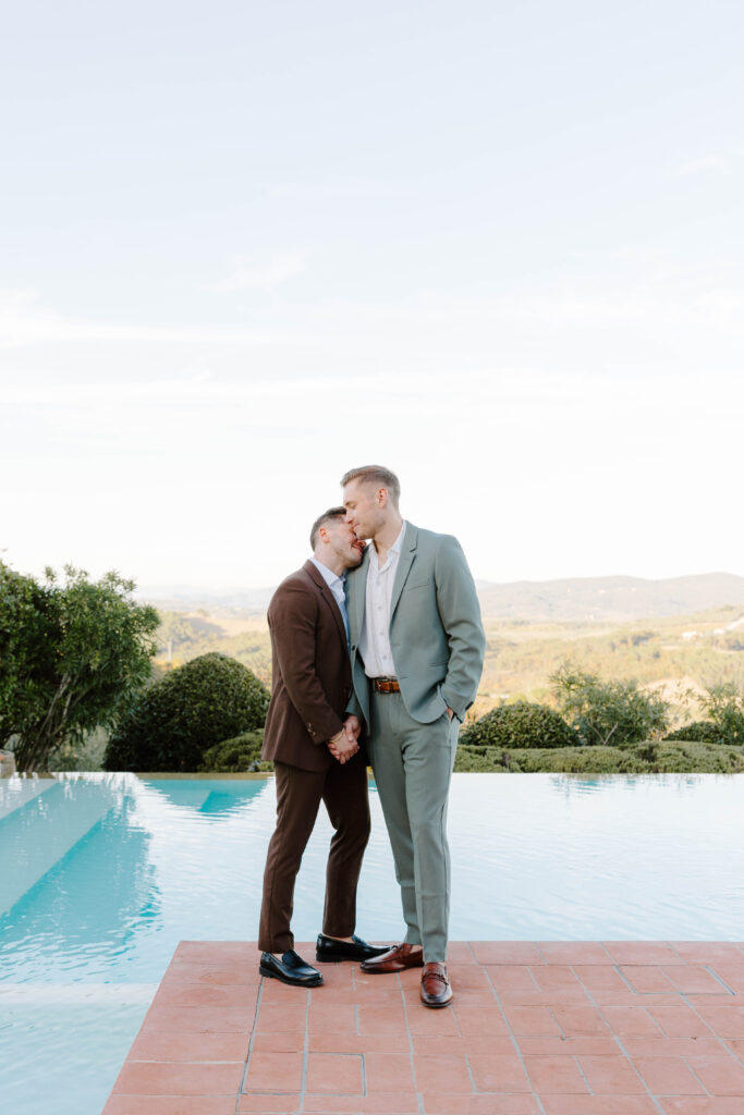 Grooms express their love for each other poolside