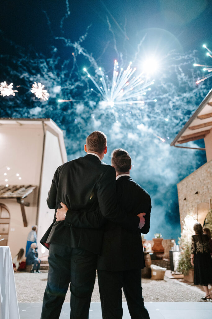 grooms celebrate wedding with fireworks