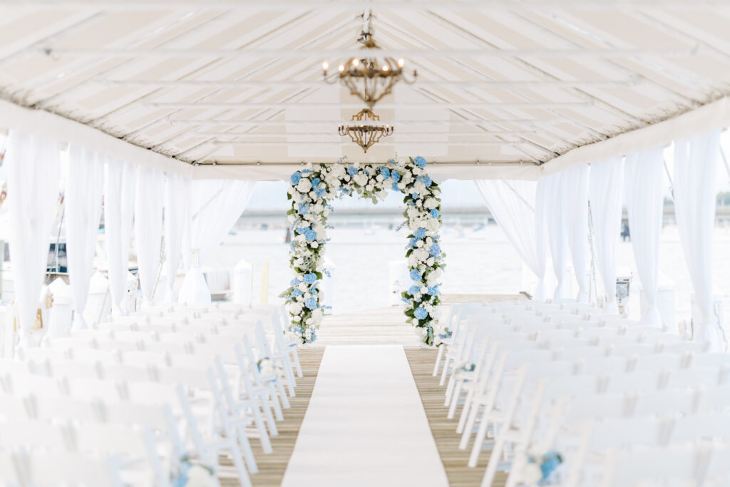 floral arbor wedding ceremony taken by best photographer in rhode island