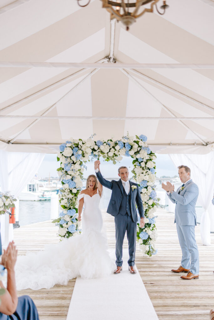 bride and groom celebrate marriage in newport rhode island