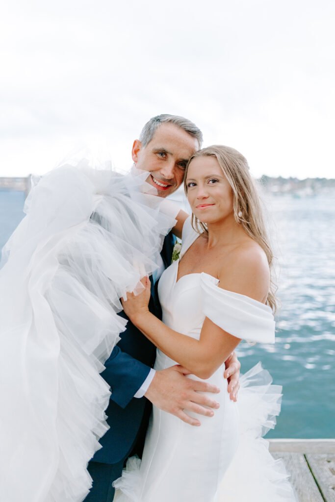 bride and groom smiling at camera at newport rhode island wedding