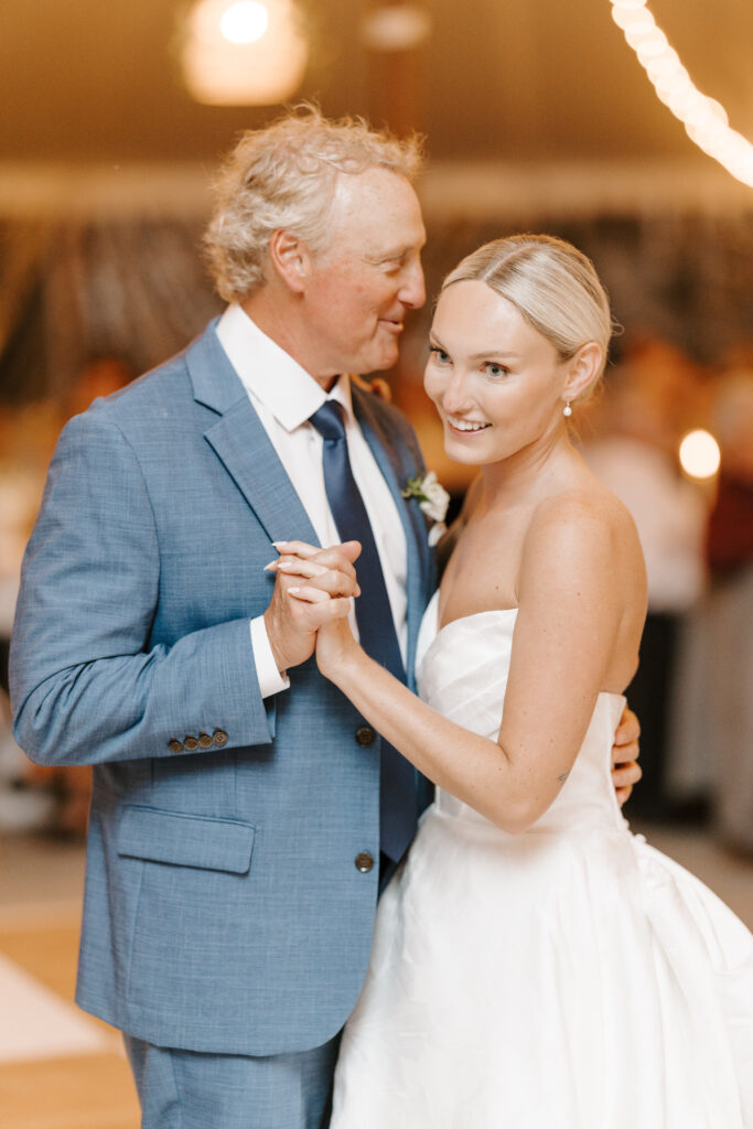 bride and father share first dance