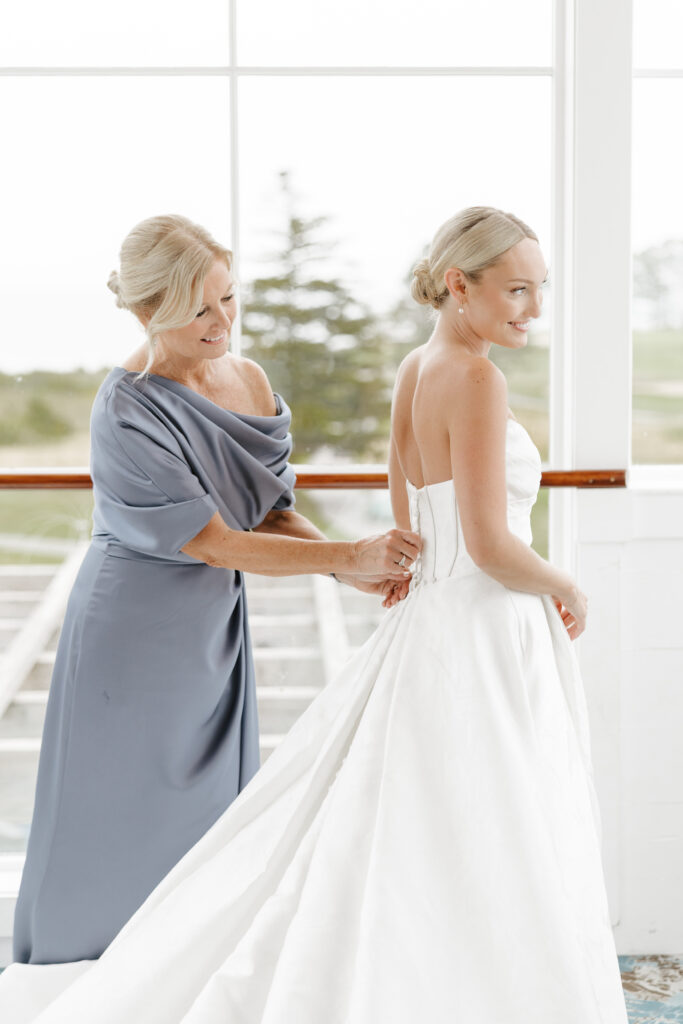 mother buttons daughters wedding dress