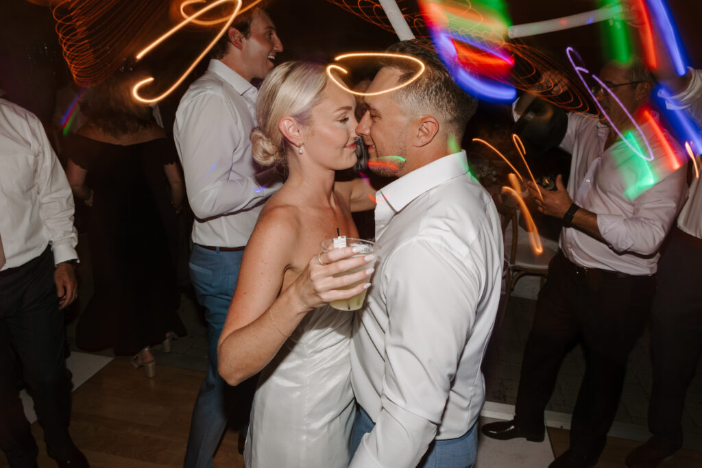 bride and groom dance together at wedding at the samoset resort taken by great wedding photographer in maine