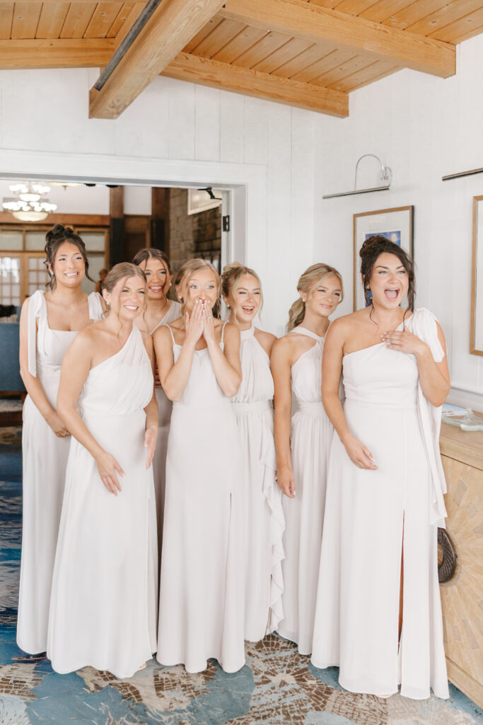 bridesmaids celebrate their friend on her wedding day