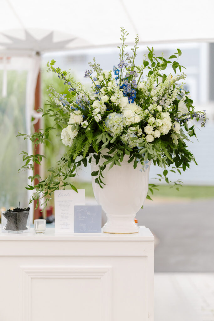 flower arrangement at tented reception in maine