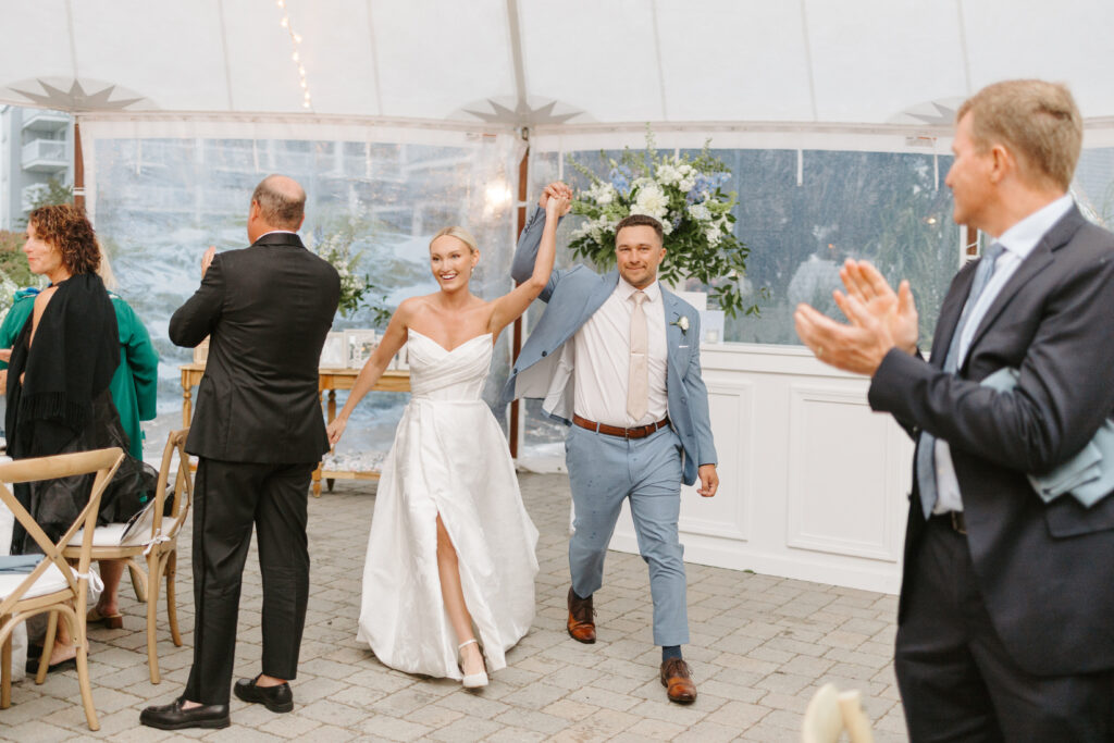bride and groom at their grand entrace for their reception