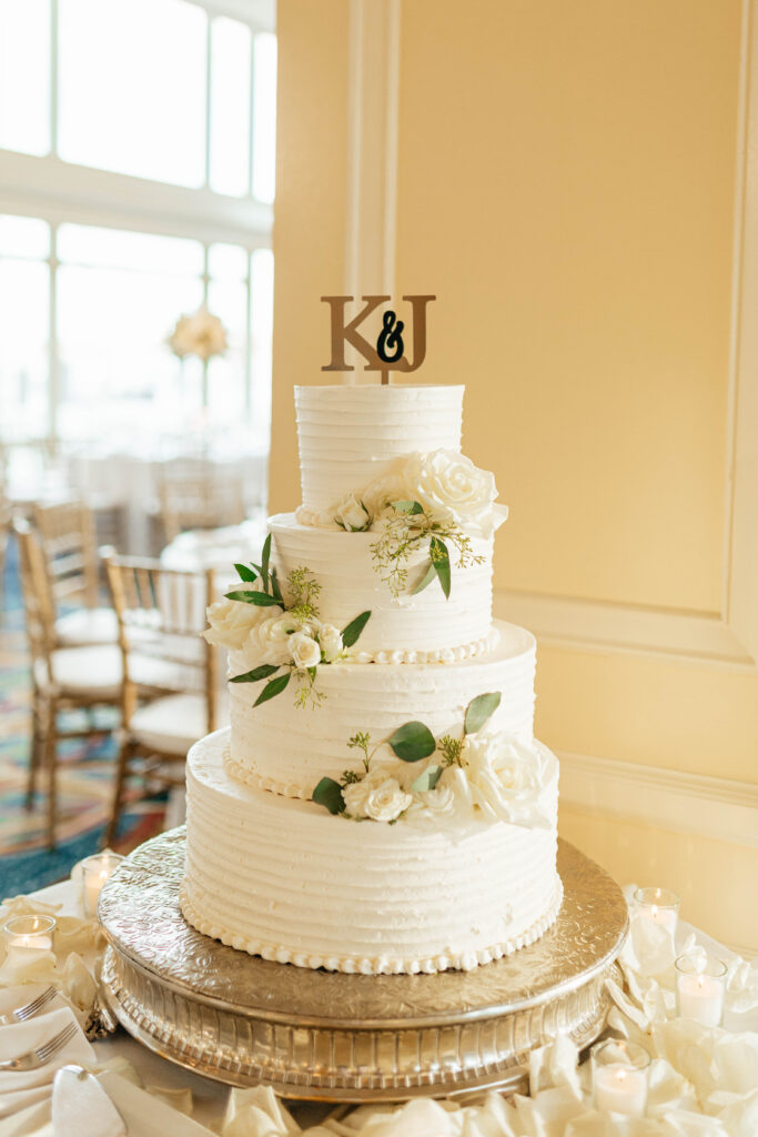 wedding cake with pretty yellow flowers
