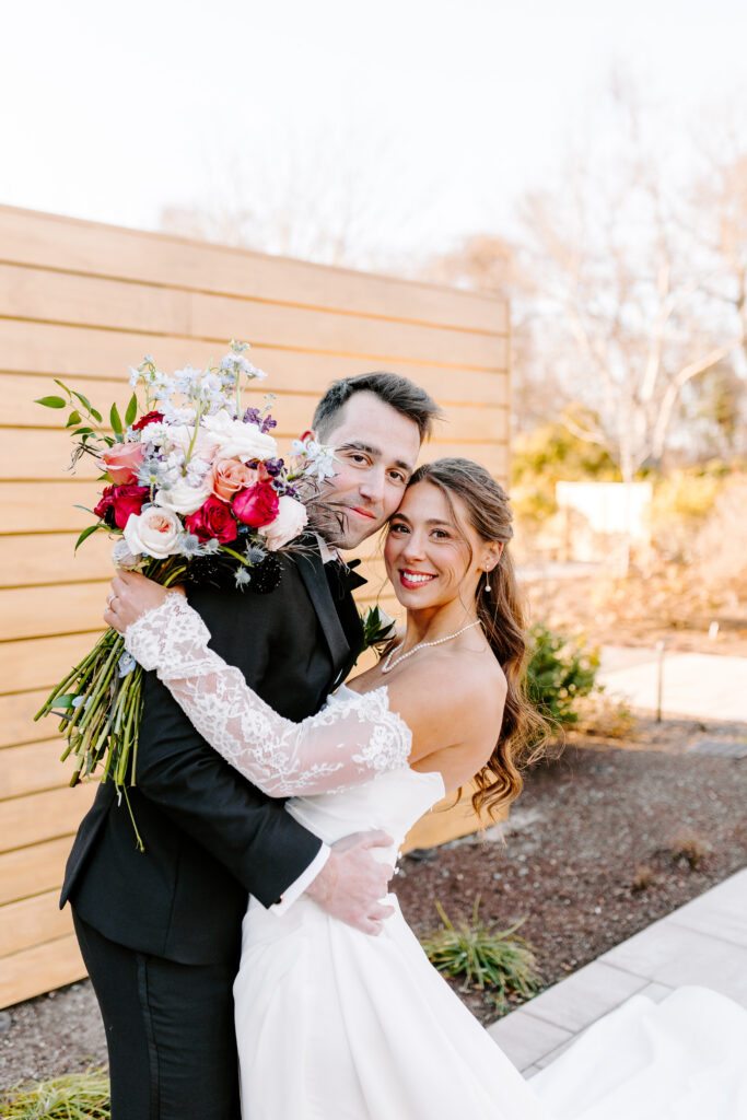 bride and groom smile taken by best cape cod wedding photographer