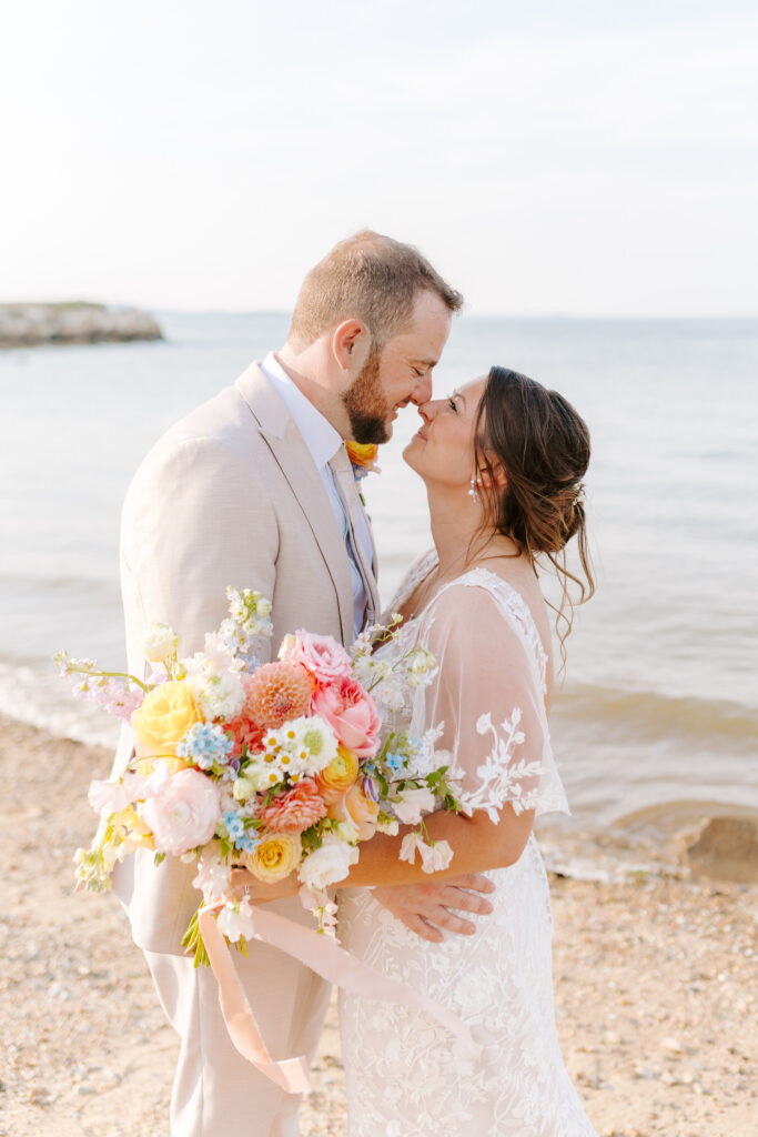 bride and groom portrait on beach in massachusettts