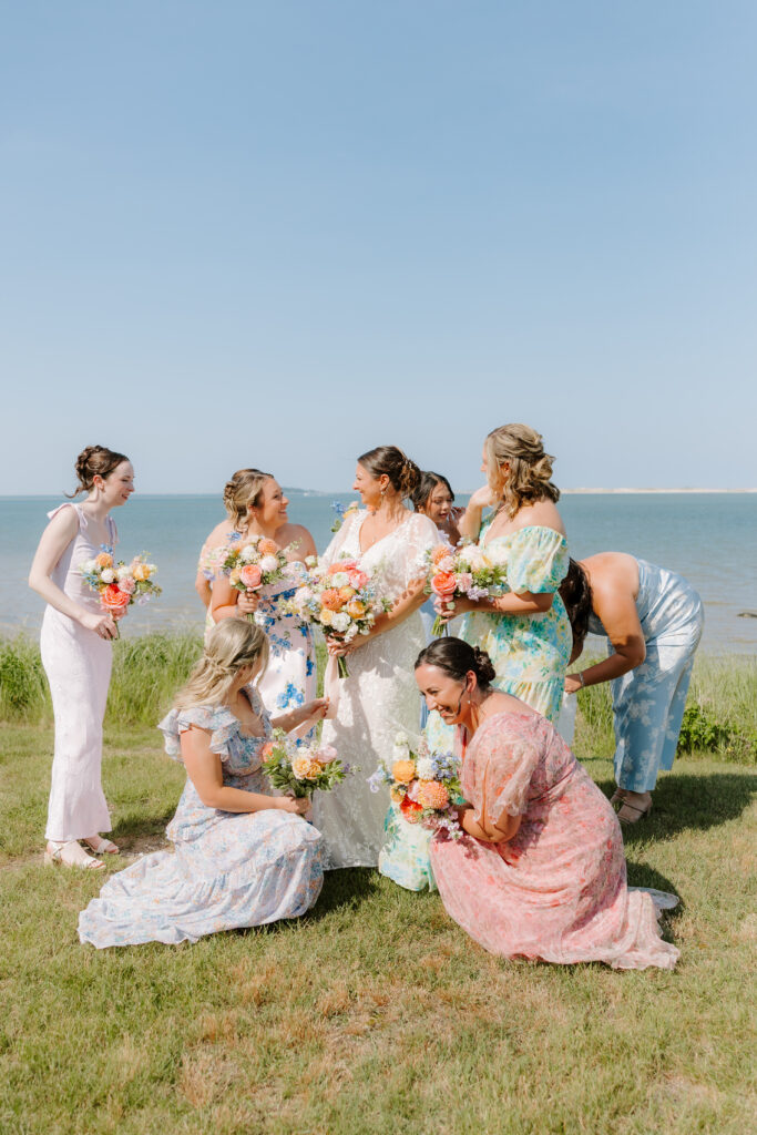 bridesmaids help bride get ready for ceremony