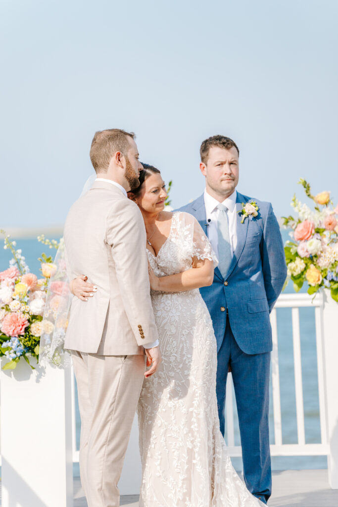 bride and groom share moment at wedding ceremony