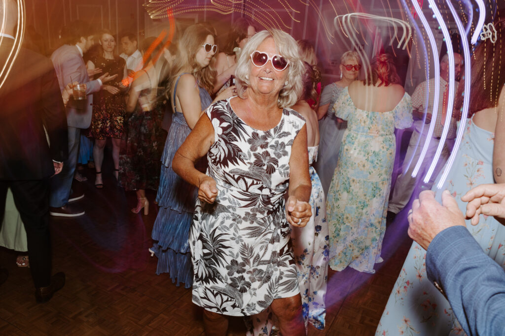 wedding guest dances at wedding receptionn