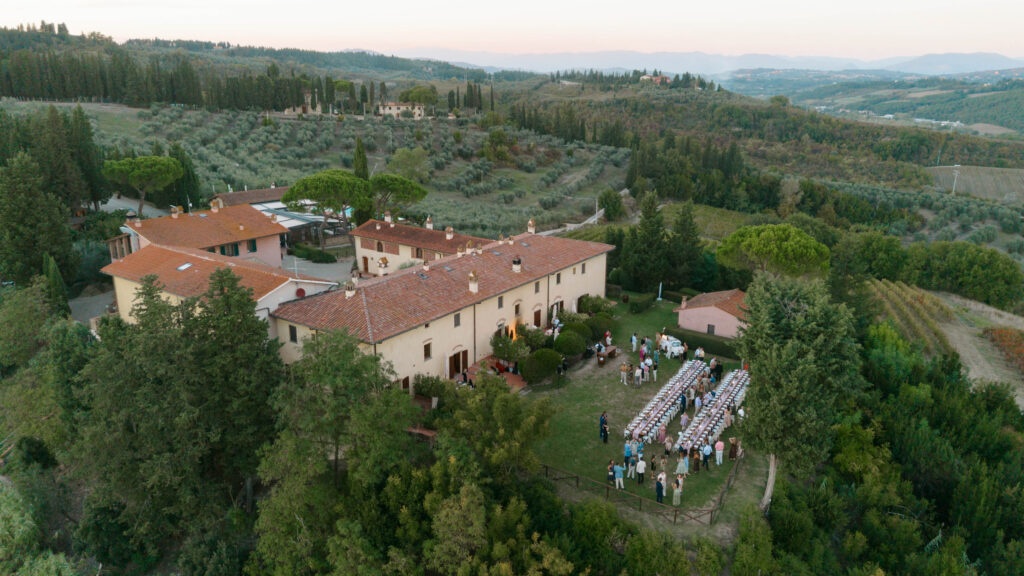 drone shot of vineyards in tuscany