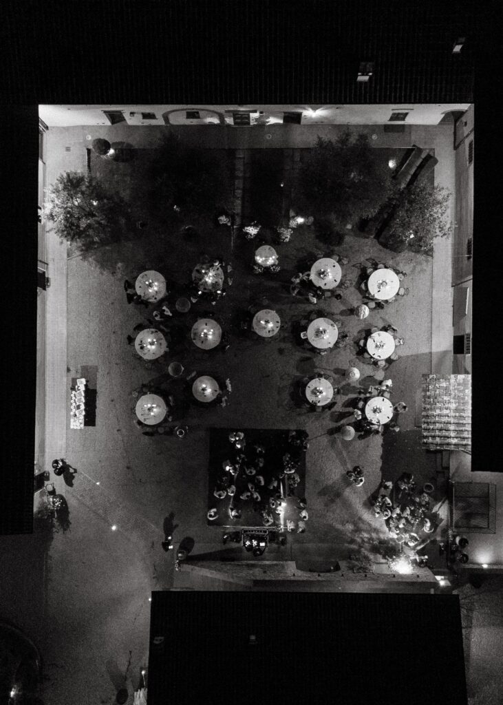 ariel shot in black and white of reception tables in europe