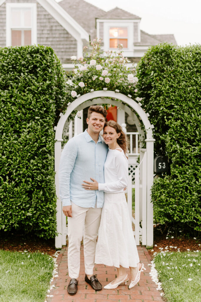 couple smiles at camera in nantucket taken by nantucket wedding photographer