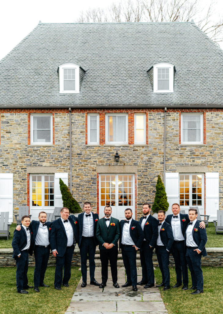 groomsmen photo in front of Shepherd’s Run in Rhode Island wedding venue