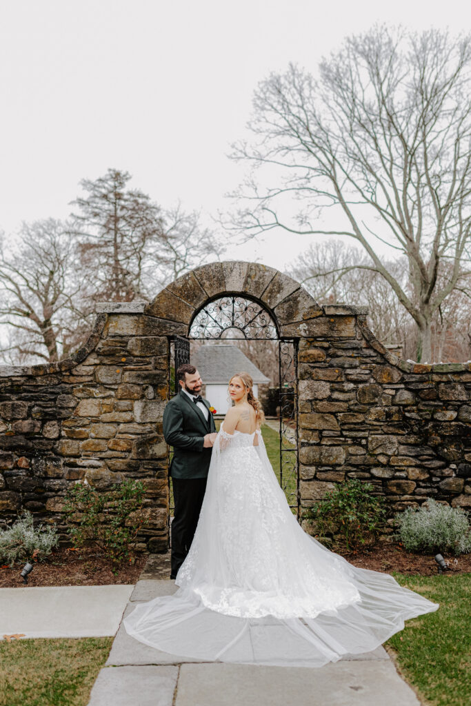 bride and groom smile for camera on wedding day at Shepherd’s Run in Rhode Island