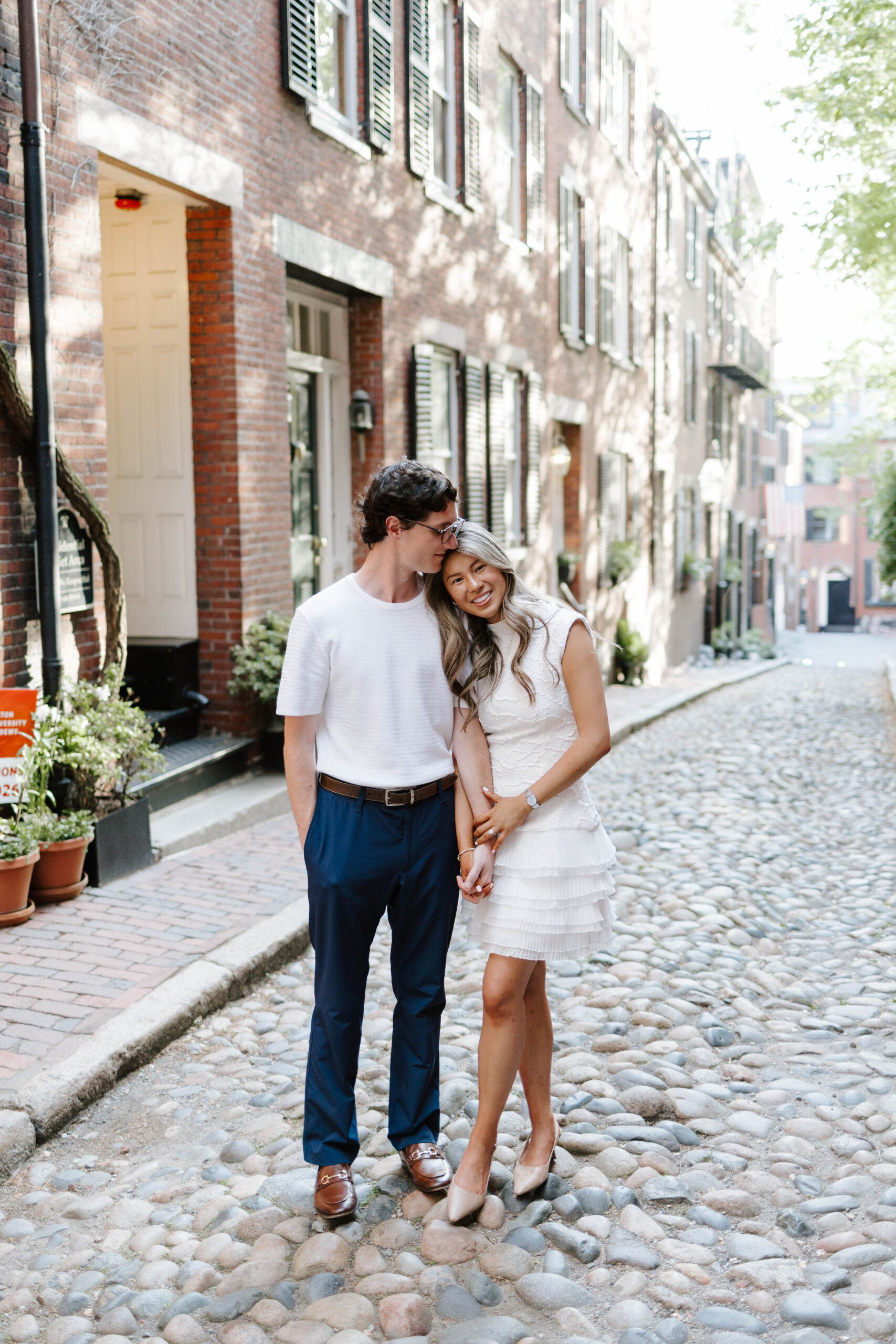 Couple smiling together on Acorn Street in Beacon Hill Boston