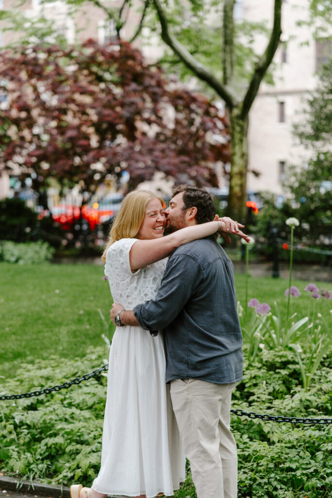Romantic garden engagement portraits in the West Village of Manhattan. Photo by Clay Taylor Photo