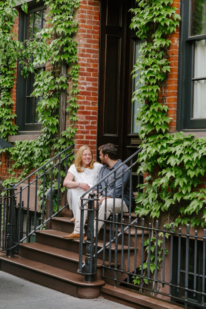 Romantic brownstone stoop engagement portraits in the West Village of New York City. Photo by Clay Taylor Photo