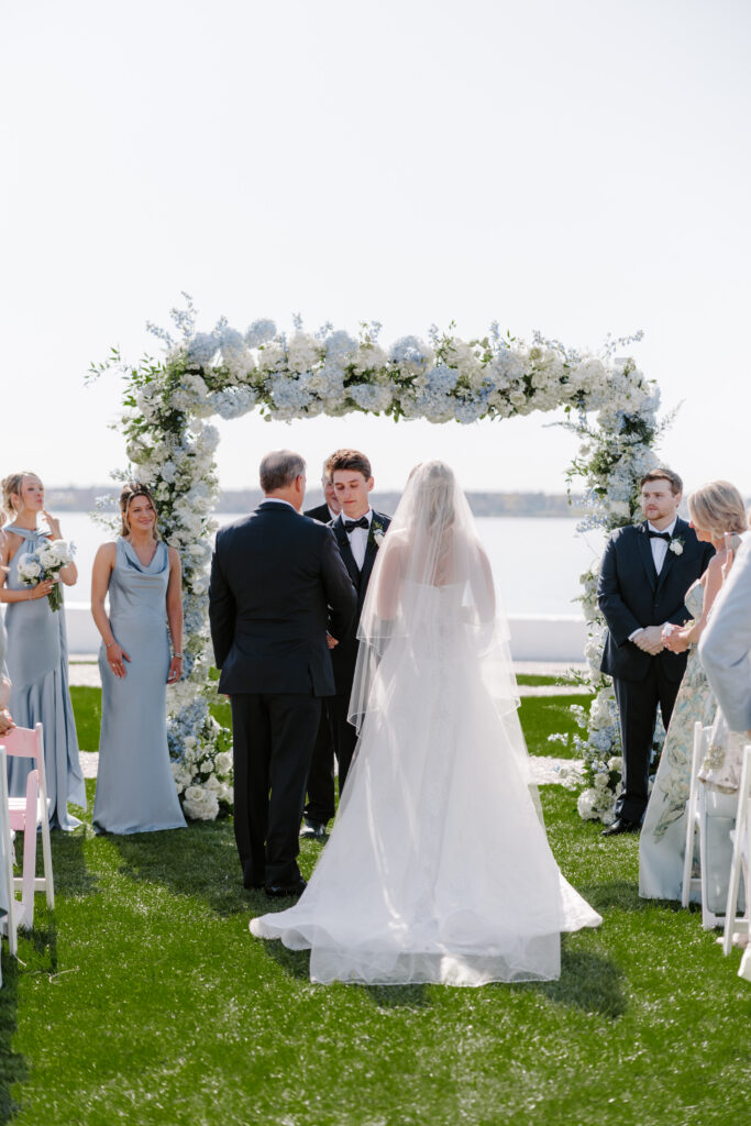 Ceremony photo of bride's father giving her away