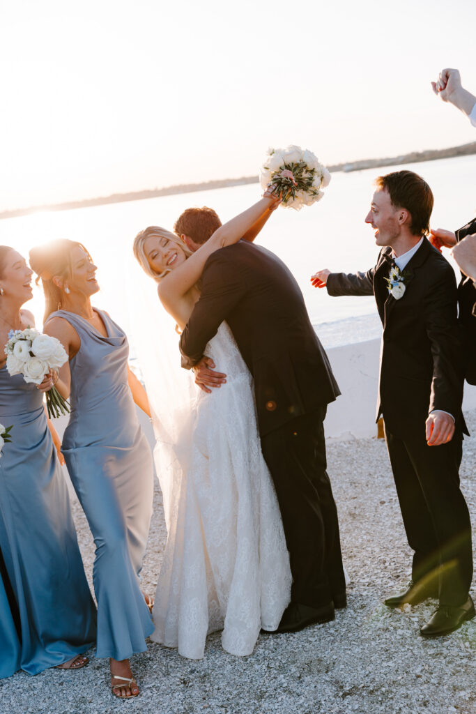 Wedding party portrait at sunset at Belle Mer