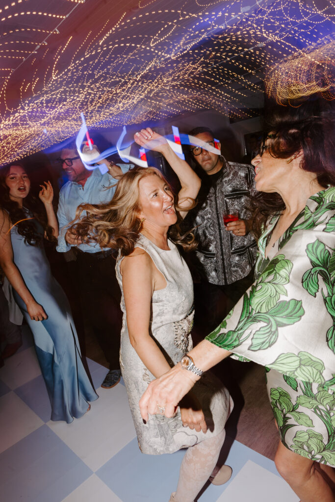 Guest dances at Belle Mer wedding reception
