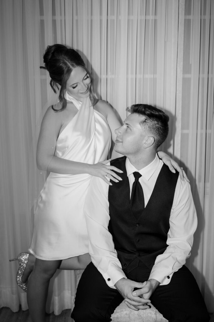 Black and white late night bride and groom portrait with flash