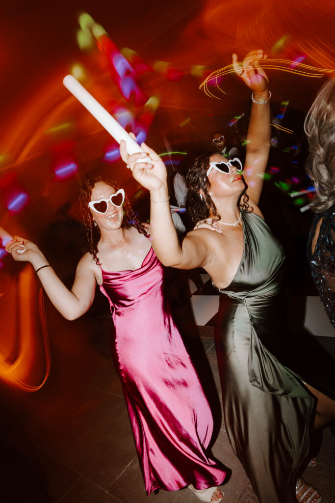 Guests dancing at wedding reception taken by documentary wedding photographer in Rhode Island