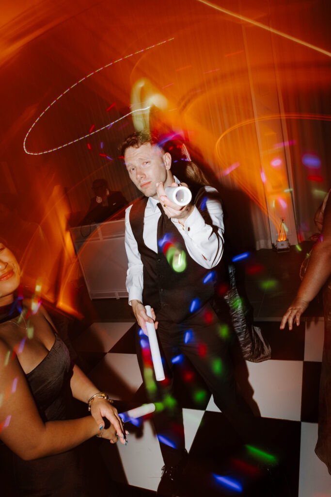 Man dances at wedding reception