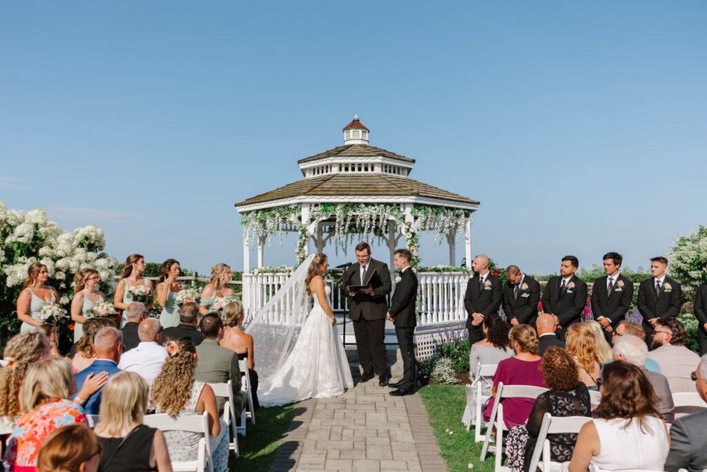 wedding ceremony at the white cliffs country club in plymouth, massachusetts