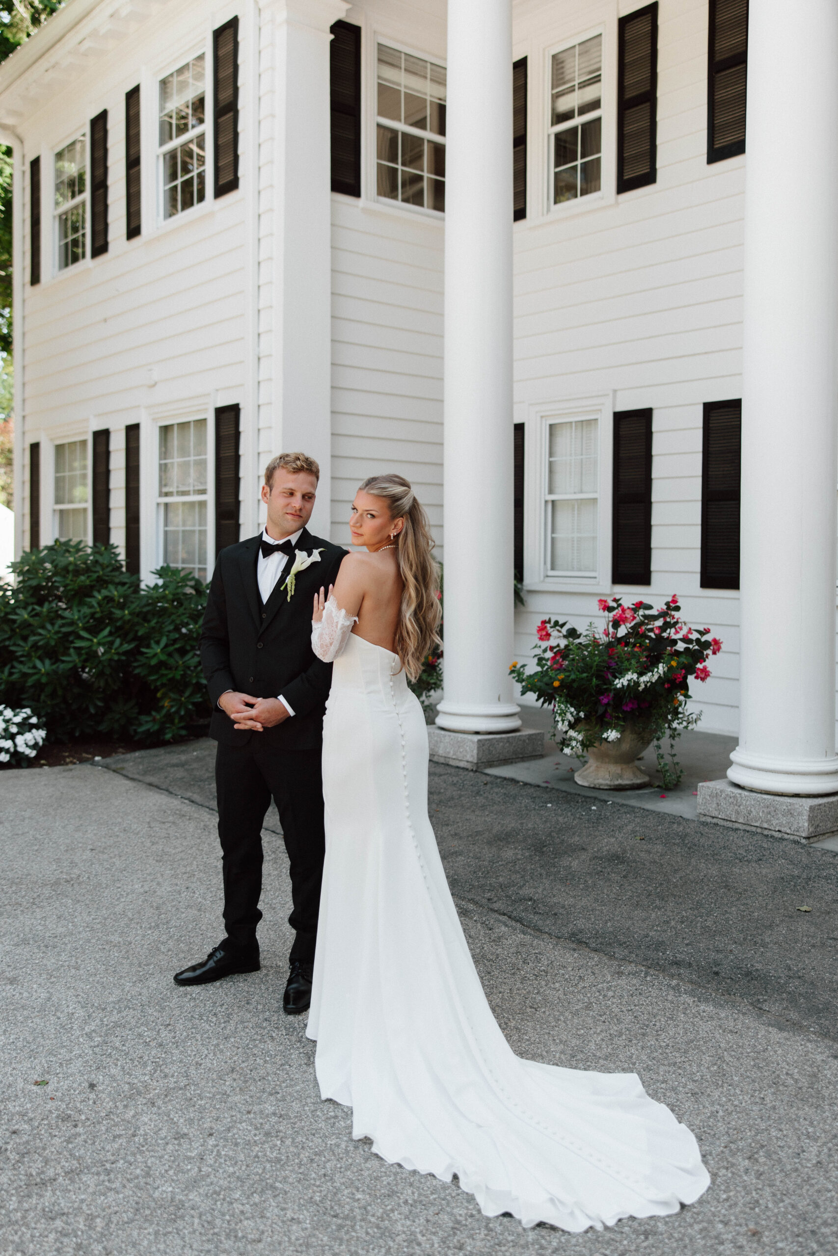 Bride and groom portrait in front of the Floriana wedding venue in Ipswich, Massachusetts