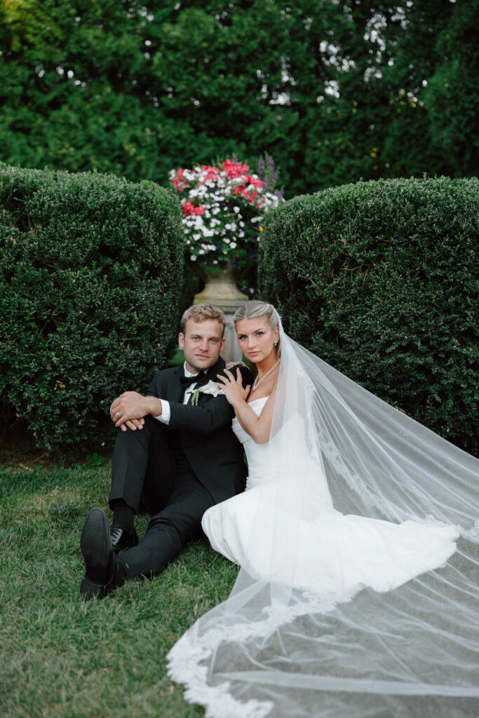 Bride and groom portrait in the garden at the Floriana in Ipswich, Massachusetts